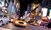 Blurred image of yellow taxi
