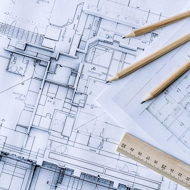 Architectural drawing on a poster, poster has pencils and rulers