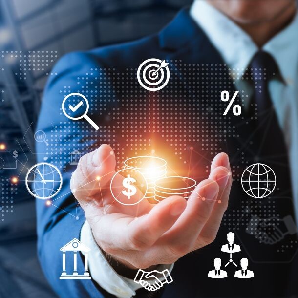 A person (seemingly male) stands wearing a suit holding their right hand up. In their hand, is an orange focus of light surrounded by white icons, including a magnifying glass, a target, a percentage sign, a building with columns, a group of people, and a globe.