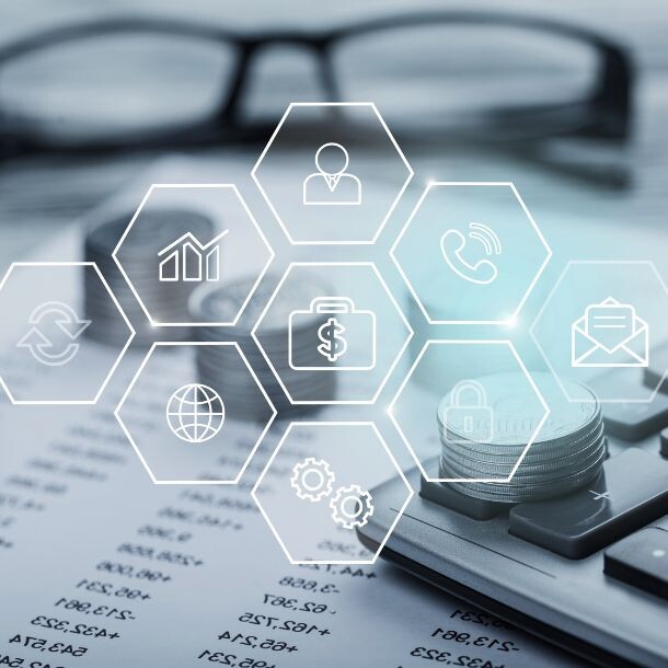 Calculator, glasses, and a pen on a paper with a list