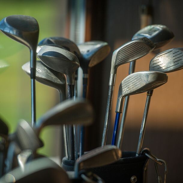 A close shot of golf clubs.