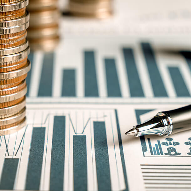 Stack of gold coins representing corporate financial growth and investment.