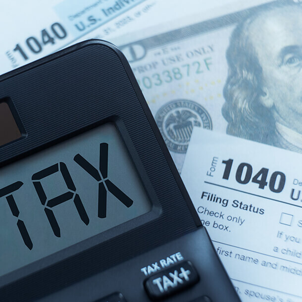 1040 income tax forms and W-2 payroll statements with federal treasury checks.